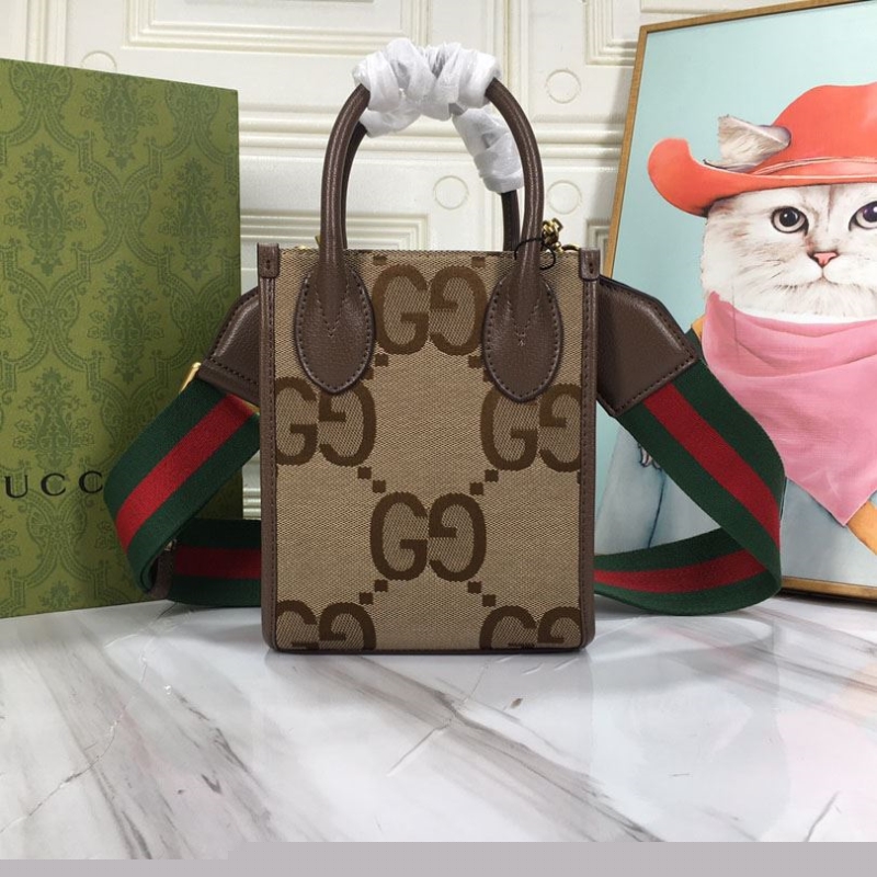 G*u*i top handle bags